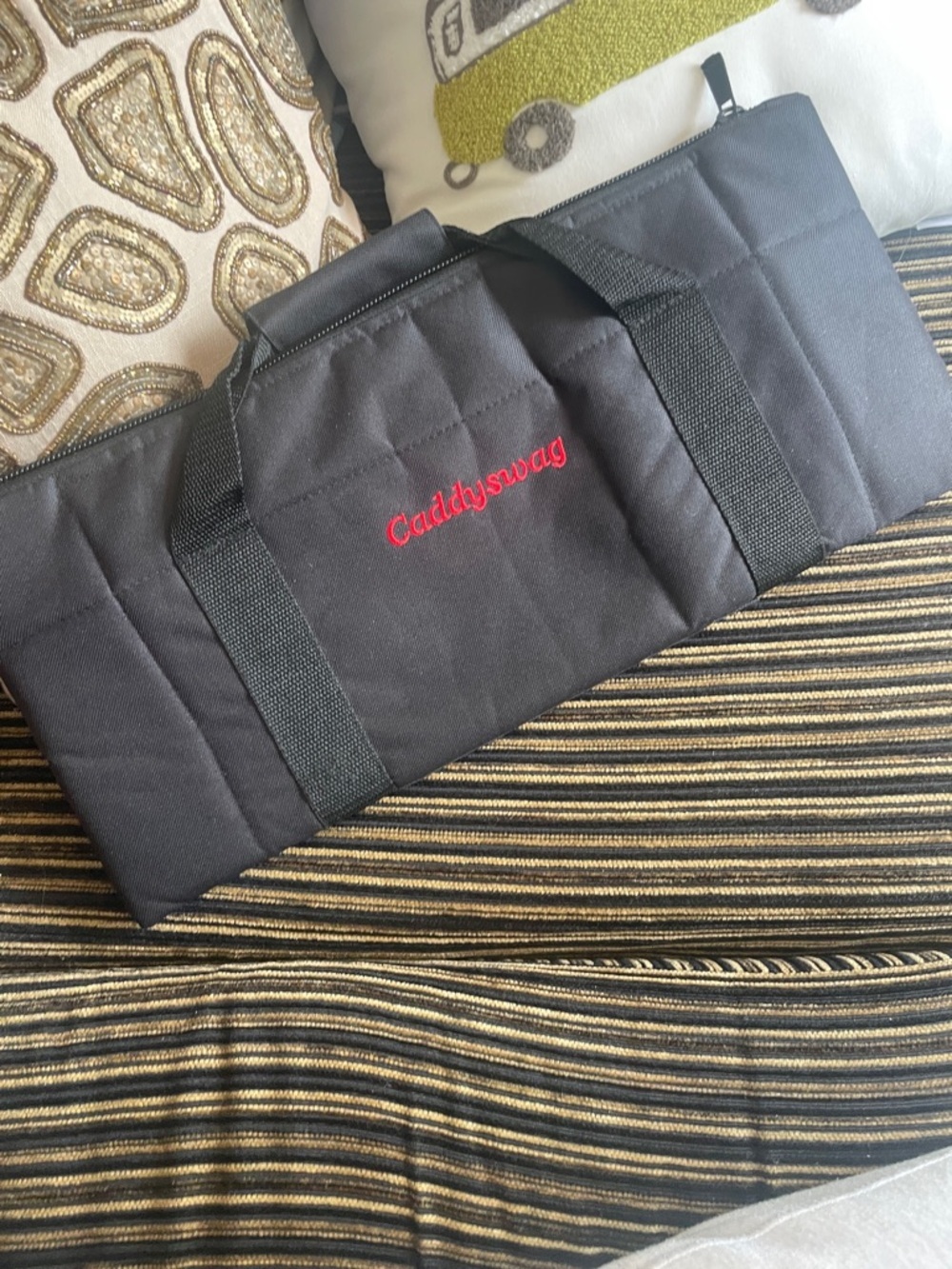 Cooler - Caddyswag Capacity: Holds six 12 oz cans or four 16 oz cans.